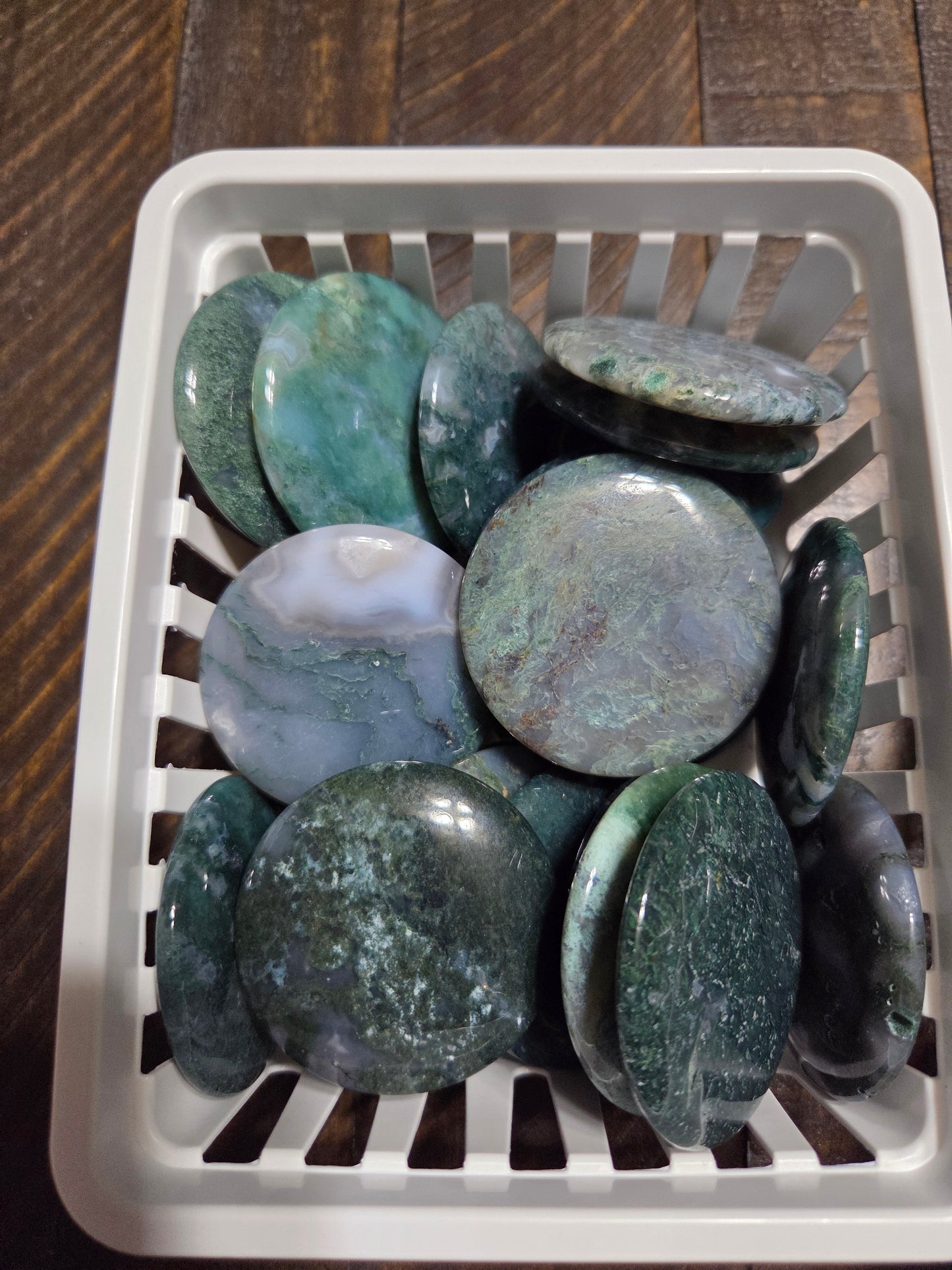 Bin of Moss agate discs